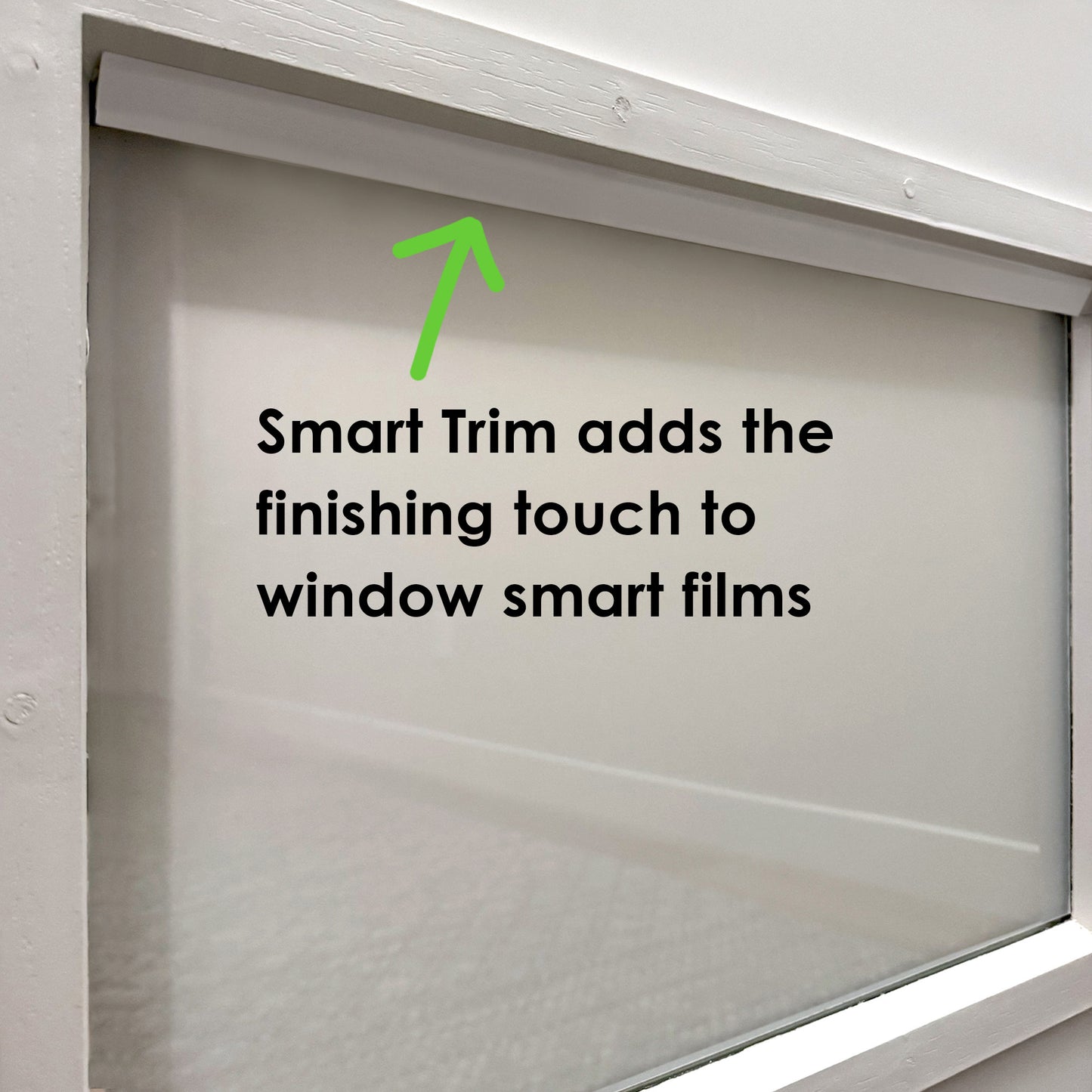 Window with white Smarter Trim installed along top edge, text overlay reading ‘Smart Trim adds the finishing touch to window smart films’.