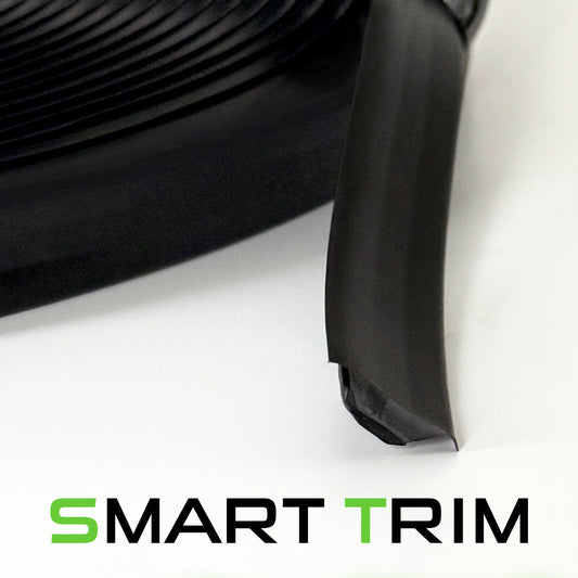 Close-up of black Smart Trim with adhesive backing, Smarter Trim logo in green and black below.