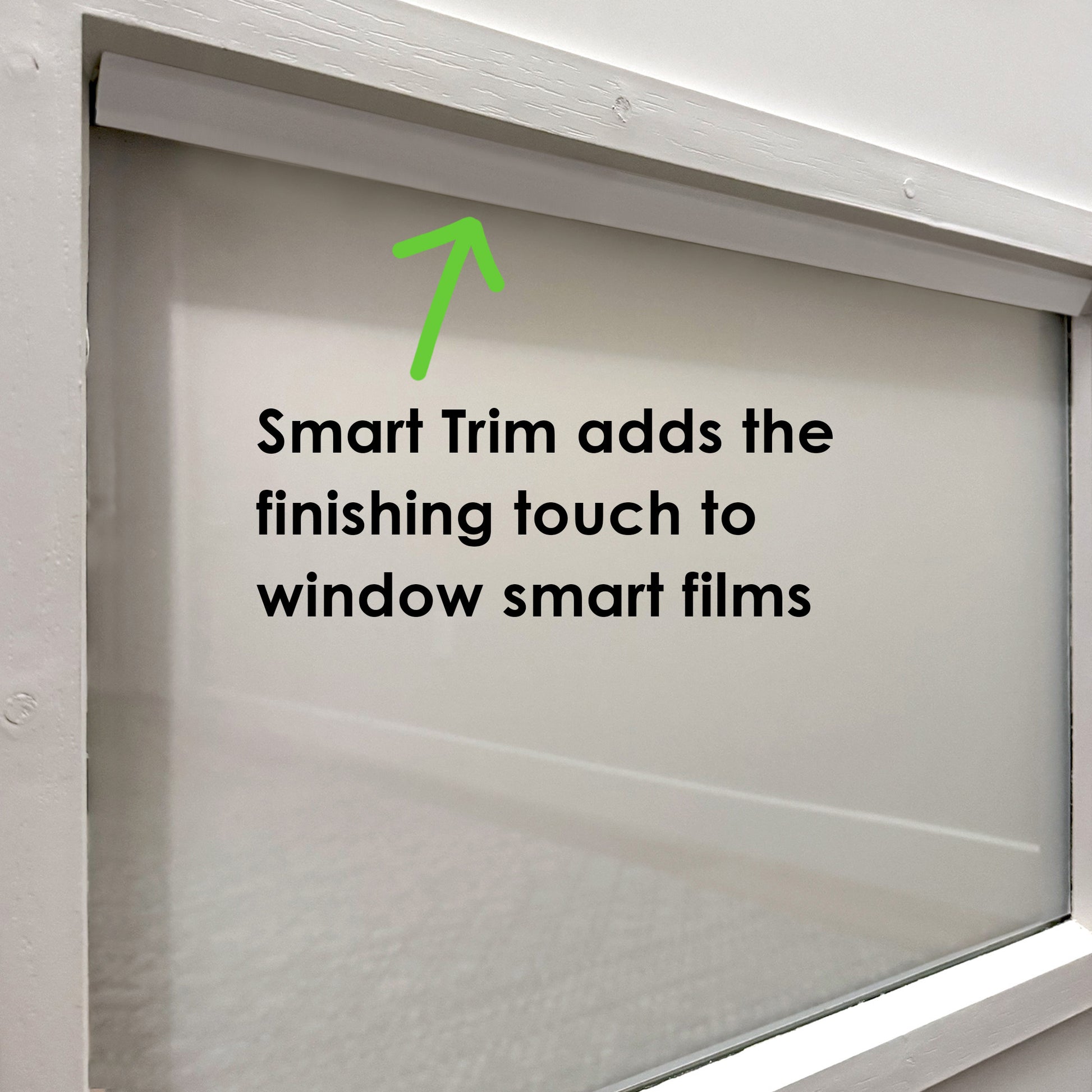 Window with white Smarter Trim installed along top edge, text overlay reading ‘Smart Trim adds the finishing touch to window smart films’.