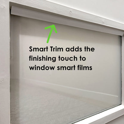 Window with white Smarter Trim installed along top edge, text overlay reading ‘Smart Trim adds the finishing touch to window smart films’.