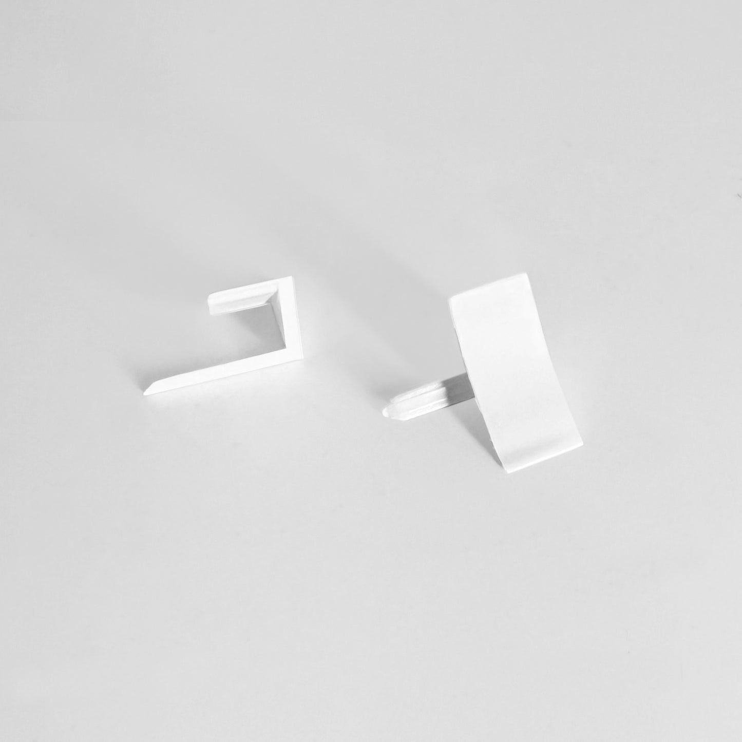 White SmarterTrim end cap finishing piece for Smart Trim or Smart Edge installation with Smart Film